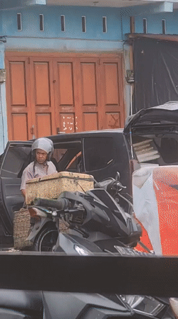 Early morning market activity recorded in Lhokseumawe, Indonesia