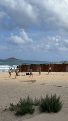 Morning beach activities captured at Italian coastal resort
