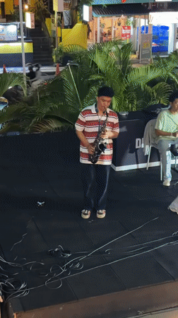 Live street band plays a night set in Kuta