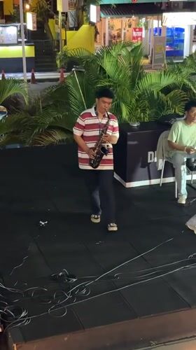 Live street band plays a night set in Kuta