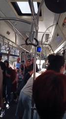 Crowded bus ride through Antalya on a summer morning