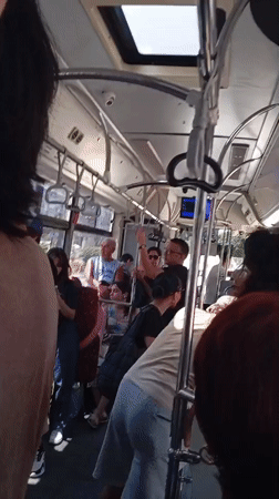 Crowded bus ride through Antalya on a summer morning