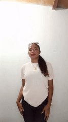 Woman dances indoors in Juan Griego, Venezuela