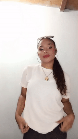 Woman dances indoors in Juan Griego, Venezuela