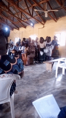 Small group gathered for a religious or communal indoor event