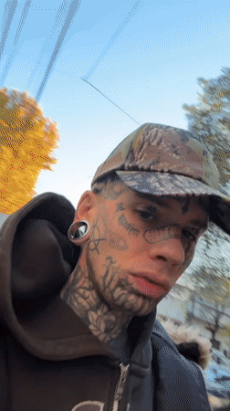 Tattooed individual filmed on Buenos Aires street mentions Iceland trip