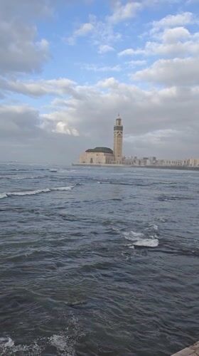 Hassan II Mosque filmed overlooking Atlantic Ocean in Casablanca