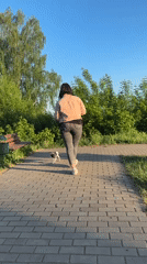 Woman and dog spend afternoon in Izhevsk park