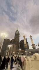 Makkah Clock Royal Tower against a cloudy sky