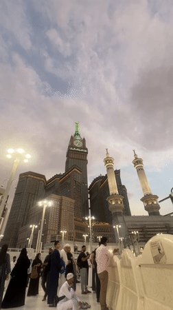 Makkah Clock Royal Tower against a cloudy sky