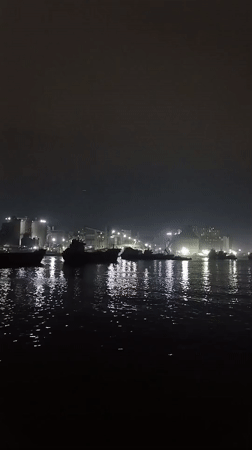 Nighttime industrial waterfront activity recorded in Nagar Kasba, Bangladesh