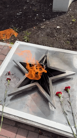 Memorial flame and bird sighted in Glazov, Russia