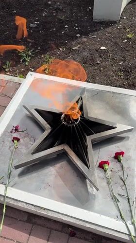 Memorial flame and bird sighted in Glazov, Russia