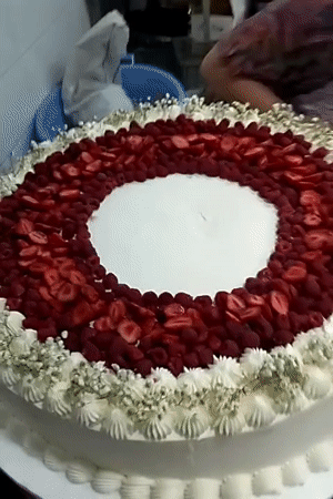 Inside an ornate Kagan venue: cakes, flowers, and decorative details