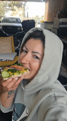 Woman enjoys early morning meal in Israeli countryside