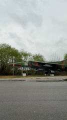 Camouflaged MiG-23 fighter jet on display in Bulgarian village