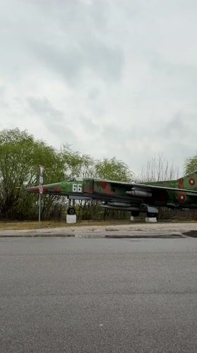 Camouflaged MiG-23 fighter jet on display in Bulgarian village