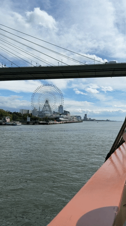 Tall ship passenger documents scenic Osaka Bay cruise views