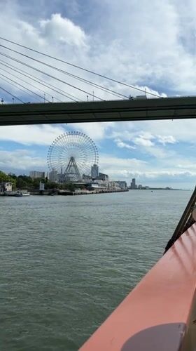 Tall ship passenger documents scenic Osaka Bay cruise views