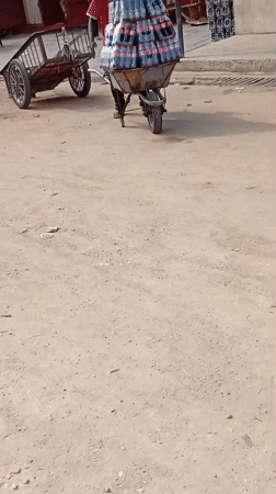 Morning street commerce documented in Maiburiji, Nigeria