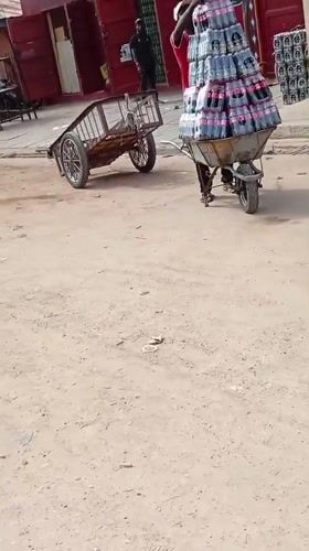 Morning street commerce documented in Maiburiji, Nigeria