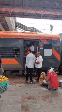 Platform life at Itarsi Junction during morning train activity