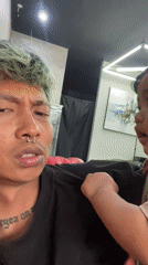 Heavily tattooed person with green hair spotted in Kuta