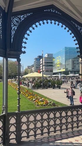 Crowds gather at Stuttgart monument on sunny Saturday morning